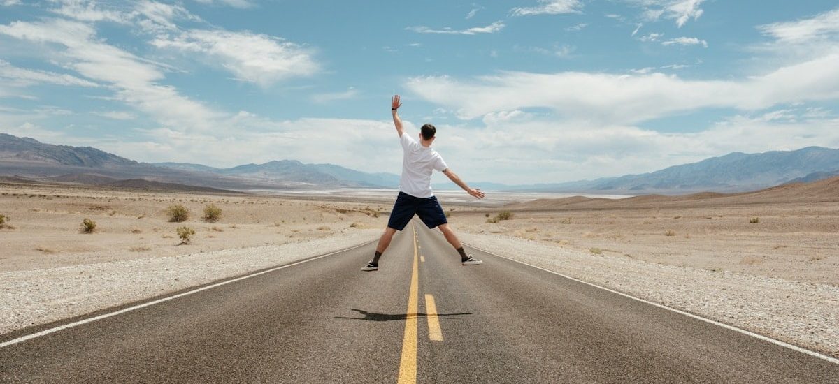 man jumping during daytime